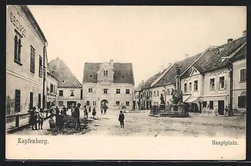 AK Kapfenberg, Hauptplatz mit Säulendenkmal und Geschäftshäusern