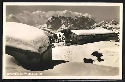 AK Eggenalm, Hütte mit Wildem Kaiser im Schnee