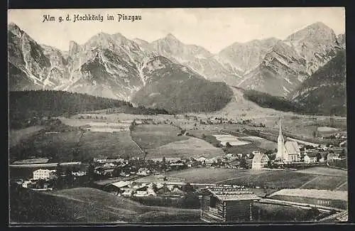 AK Alm im Pinzgau, Teilansicht mit Kirche gegen den Hochkönig