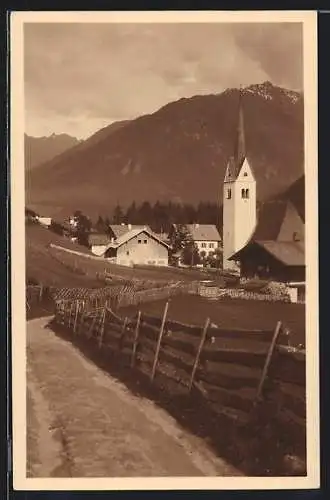 AK Wald /Oberpinzgau, Strassenpartie mit Kirche