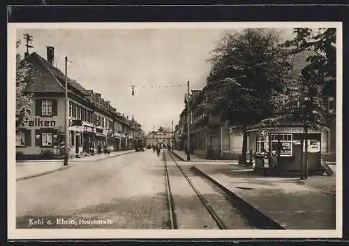 AK Kehl a. Rhein, Hauptstrasse mit Kiosk und Geschäften