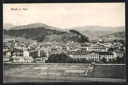 AK Bruck a. Mur, Teilansicht mit Bergen