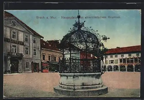 AK Bruck a. Mur, Hauptplatz mit altertümlichem Brunnen