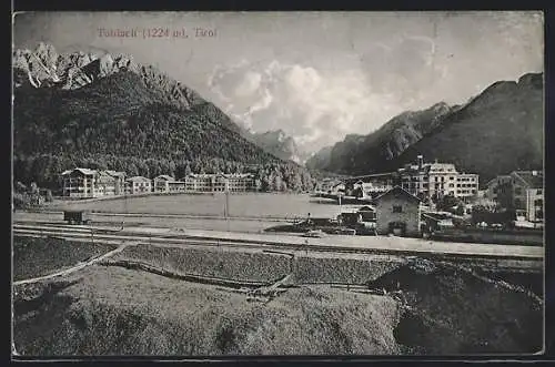 AK Toblach, Ortsansicht mit Bahngleisen