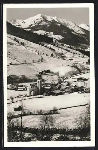 AK Saalbach, Ortspartie mit Kirche im Schnee
