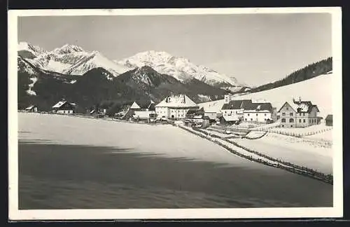 AK Hohentauern, Ortspartie mit Bergen im Schnee
