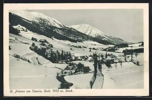 AK St. Johann am Tauern, Teilansicht mit Kirche im Schnee