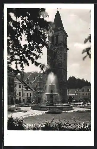 AK Judenburg, Springbrunnen am Uhrenturm