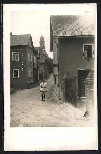 Foto-AK Steckenroth, Strassenpartie mit Kirche im Hintergrund, Ca. 1927