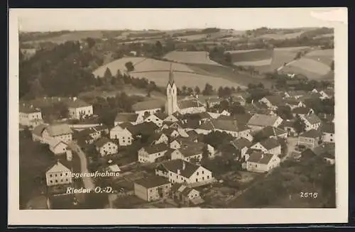 AK Riedau /O.-D., Teilansicht mit Kirche, Fliegeraufnahme