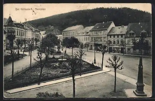 AK Bad Gottleuba, Anlagen mit Denkmal auf dem Marktplatz