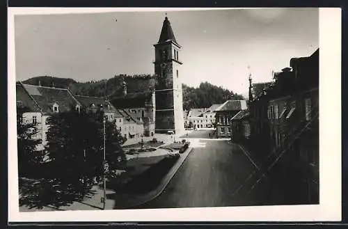 AK Judenburg /Steiermark, Strassenpartie mit Stadtturm