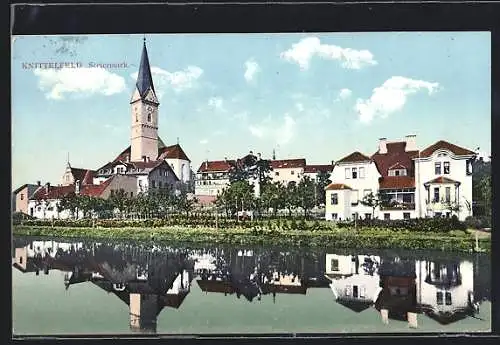 AK Knittelfeld /Steiermark, Uferpartie mit Kirche