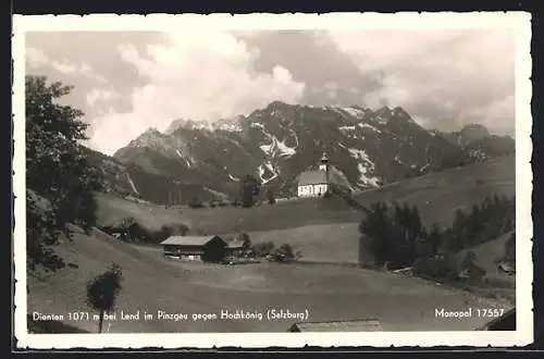 AK Dienten bei Lend, Ortspartie mit Kirche gegen Hochkönig