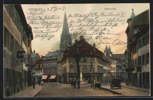 AK Freiburg i. Br., Strassenpartie Oberlinden mit Blick zur Kirche