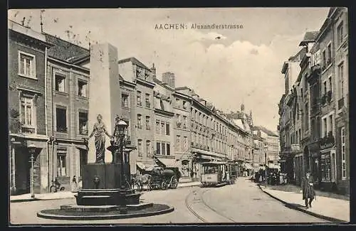 AK Aachen, Alexanderstrasse mit Geschäften, Brunnen und Strassenbahn