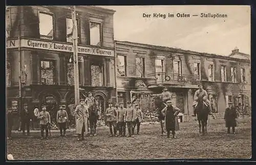 AK Stallupönen, Strassenpartie mit ehem. Cigarren Geschäft, Krieg im Osten