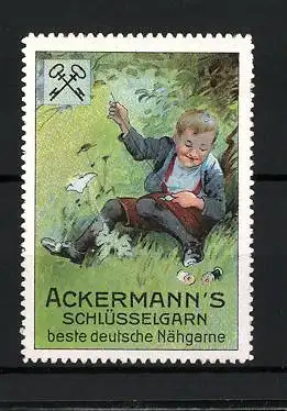 Reklamemarke Ackermann's Schlüsselgarn, beste deutsche Nähgarne, Knabe näht seine Hose auf einer Blumenwiese