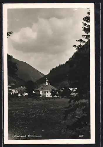 AK Gusswerk /Steiermark, Ortspartie mit Kirche und Friedhof