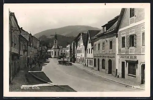 AK Weyer /Enns, Strassenpartie mit Uhrmacher und Kirche