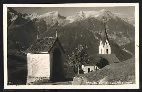 AK Tobadill, Ortsansicht mit Kirche gegen die Lechtaler