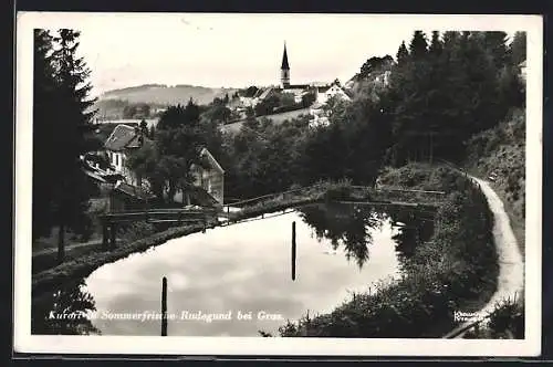 AK St. Radegund am Schröckl, Ortsansicht mit Kirche vom Teich aus