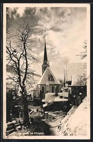 AK Taxenbach i. Pinzgau, Ortspartie an der Kirche im Winter