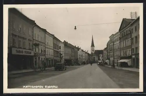 AK Mattighofen, Strassenpartie mit Geschäften