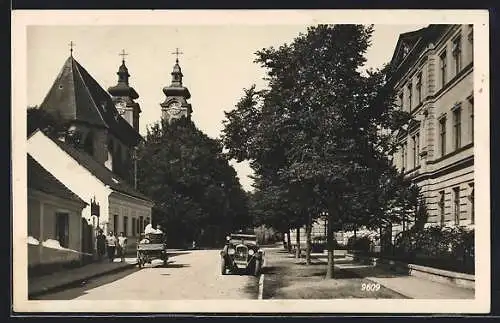 AK Tulln, Kutsche und Auto auf der Wienerstrasse