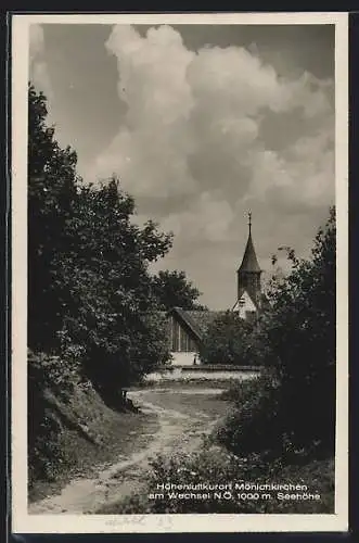 AK Mönichkirchen, Strassenpartie mit Kirche
