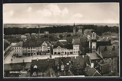 AK Wittstock /Dosse, Blick auf die Hauptstrasse mit verschiedenen Geschäften, Bäckerei Café, Buchdruckerei