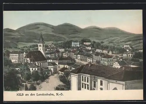 AK Kilb an der Landesbahn, Ortsansicht mit Kirche gegen die Berge