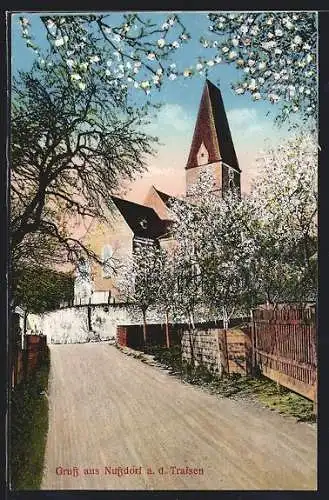 AK Nussdorf / Traisen, Kirchenansicht während der Baumblüte