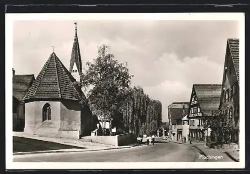 AK Plochingen, Strassenpartie mit Kirche