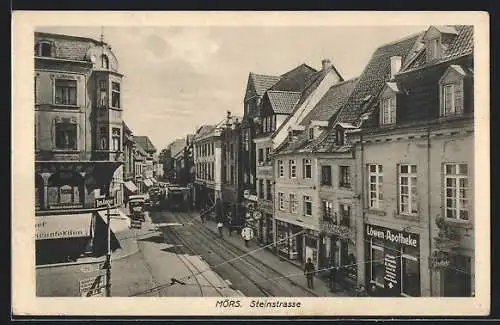 AK Mörs, Steinstrasse mit Löwen-Apotheke, Strassenbahn