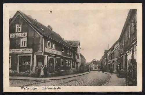 AK Weferlingen, Bäckerstrasse mit Geschäftshaus Friedrich Rath