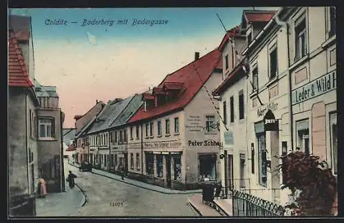 AK Colditz, Baderberg mit Badergasse, Strassenpartie mit Geschäften