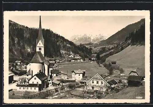 AK Hüttau im Pongau, Teilansicht mit Kirche gegen Hochkönig