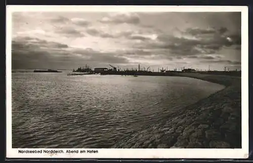 AK Norddeich / Norden, Der Hafen am Abend