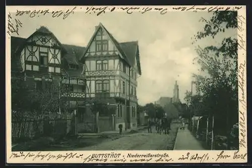 AK Buttstädt, Niederreisserstrasse mit Villa und Kirche