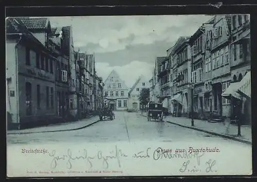 Mondschein-AK Buxtehude, Breitestrasse mit Geschäftshäusern