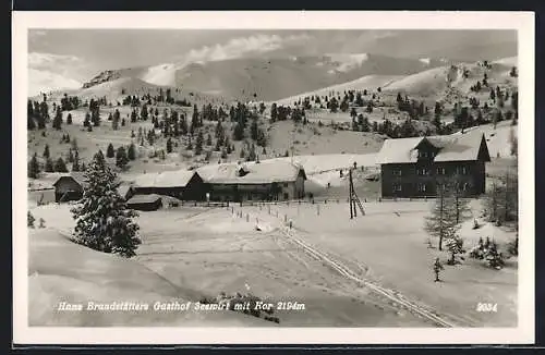 AK Turracherhöhe, Brandstätters Gasthof Seewirt mit Kor im Winter