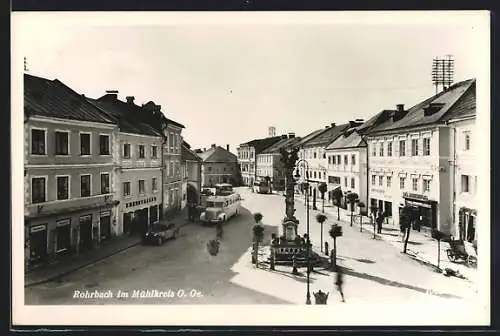 AK Rohrbach, Hauptplatz mit Geschäften und Mariensäule