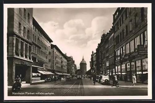 AK Mannheim, Strasse Planken mit Geschäften und Strassenbahn