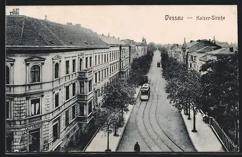 AK Dessau, Kaiser-Strasse mit Geschäft von Carl Schneider und Strassenbahn