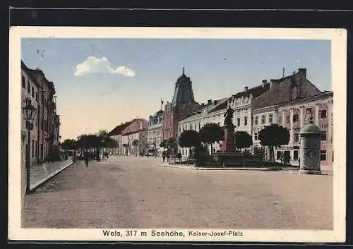 AK Wels, Kaiser-Josef-Platz mit Denkmal, Litfasssäule