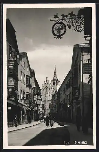 AK Schwaz, Strassenpartie mit Gasthaus und Geschäften