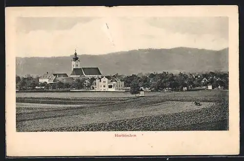 AK Hartkirchen, Ortsansicht mit der Kirche vom Feld aus