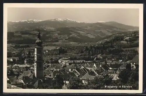 AK Wolfsberg in Kärnten, Kirchturm gegen die Berglandschaft