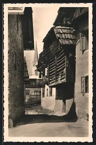 AK Techendorf a. Weissensee, Gasse mit Blick zur Kirche